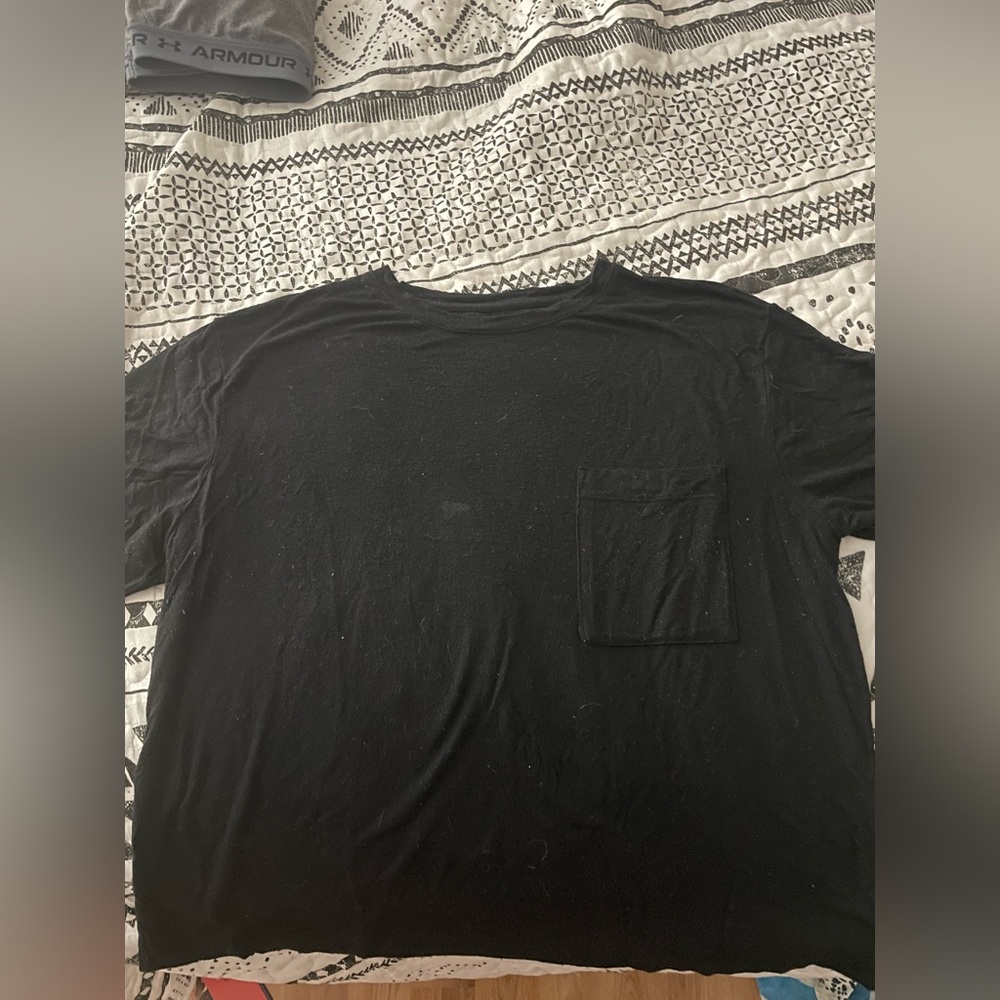large black short sleeved shirt with pocket